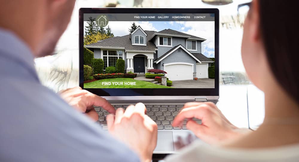 computer-screen-with-home-builder-website