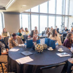 Home Builder Digital Marketing Summit attendees at tables