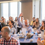 Home Builder Digital Marketing Summit attendees waving